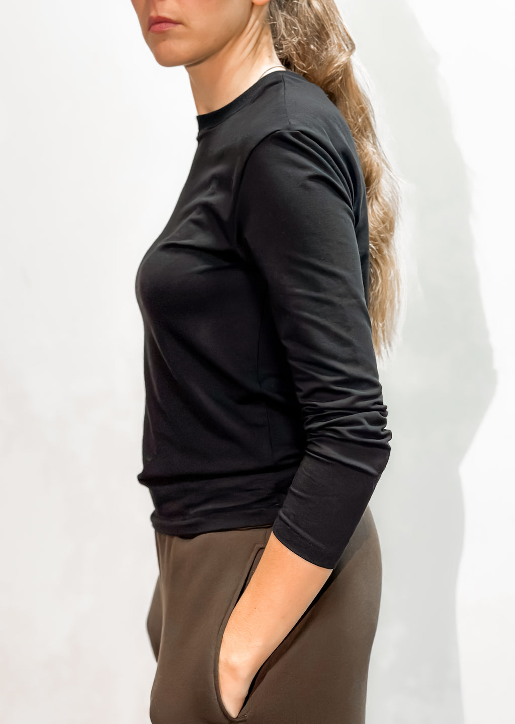 Moteriška prigludusi palaidinė iš tampraus kilpinio trikotažo