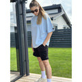 Prailginta moteriška oversize stiliaus palaidinė iš trisiūlio medžiagos “Airy blue”